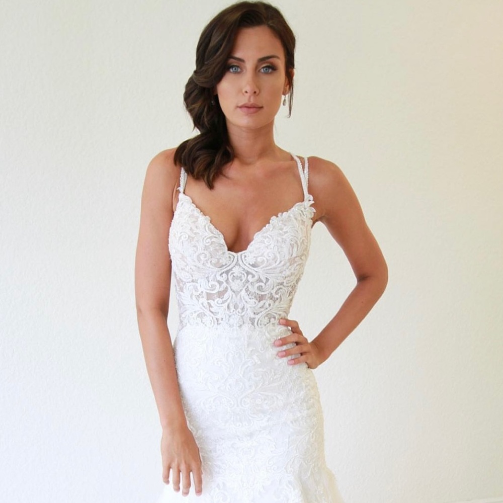 Wedding dress. It’s a 0 or 00. Actual size 6, adjusted to a 0. No drycleaned.